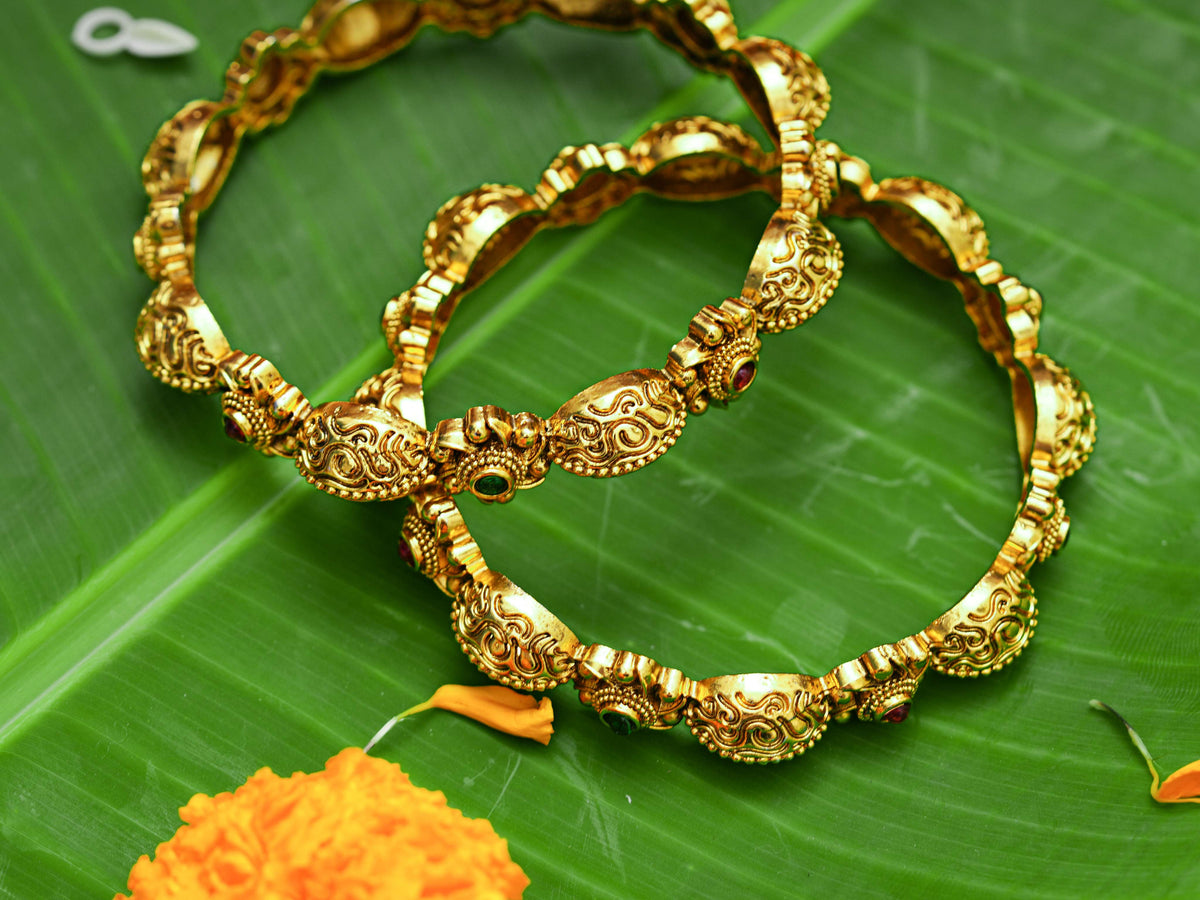 The Ramayana Royal Heritage Collection - Antique Gold-Plated Sita Kalyanam Pushpa Ratna Temple Kada Bangles (Pair)